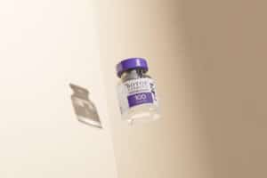 Botox Cosmetic vial with purple cap floating
