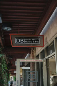 Define Beauty Medspa entrance sign and glass door
